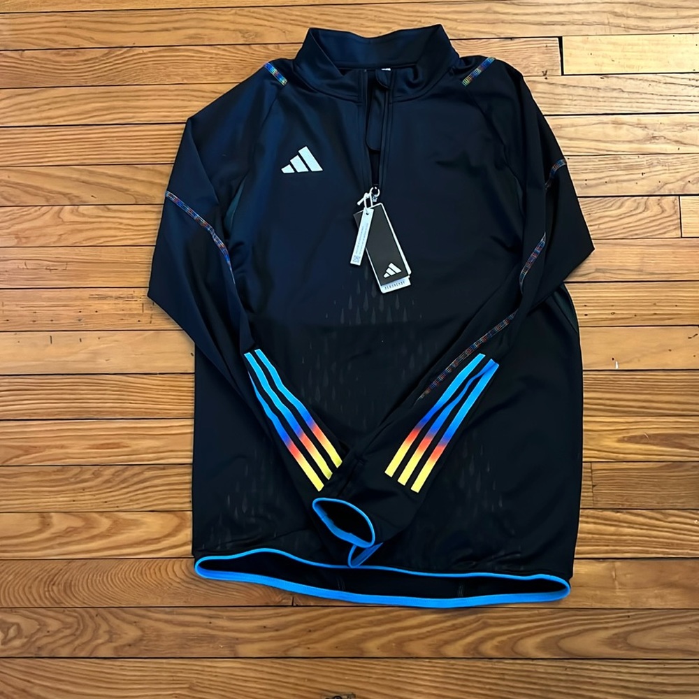 Men’s Adidas Medium black with rainbow colored long sleeves Aroready shirt NWT